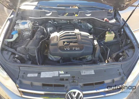 2012 Volkswagen Touareg Vr6 Executive z USA, uszkodzony, nr VIN WVGFF9BP3CD002132